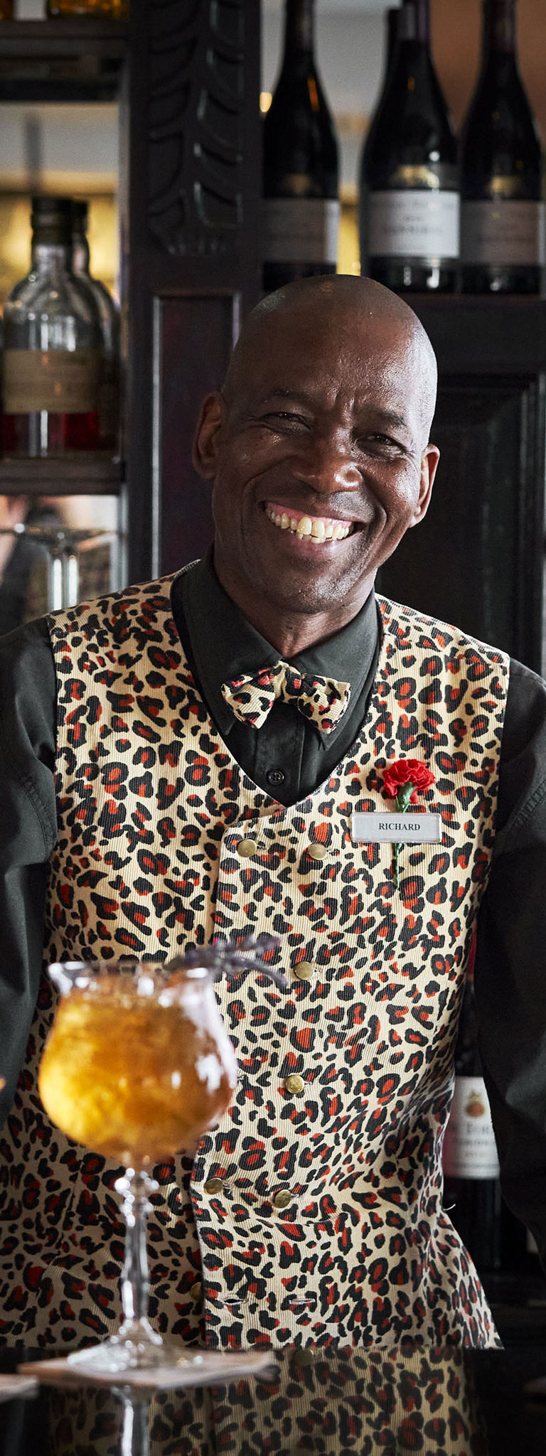 Barman serving cocktails